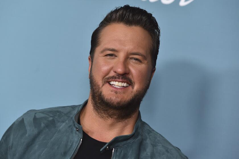 Luke Bryan didn't slip on a cellphone onstage: 'I was kind of hamming that up'