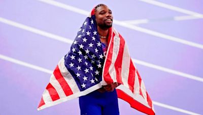 Noah Lyles' mom's reaction to son's photo-finish win in 100m creates all-time Olympics moment | Sporting News Canada