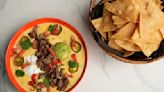 Give Queso A Major Upgrade And Top It With Smoked Brisket