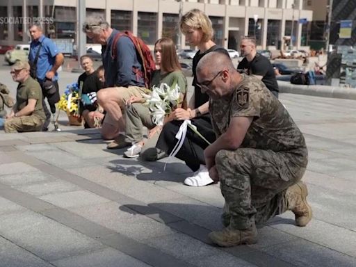 Funeral for volunteer British combat medic Peter Fouche held in Kyiv following death in east Ukraine