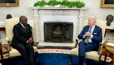 Biden, facing tempest at home, devotes time to S.Africa leader