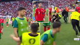 Security guard injures Portugal forward Goncalo Ramos after full-time whistle as pitch invaders cause mayhem