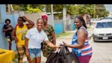 Corporate Hands | Shelly-Ann Fraser-Pryce fêtes Waterhouse residents for Easter