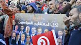 Tunisians defy protest ban and rally against president