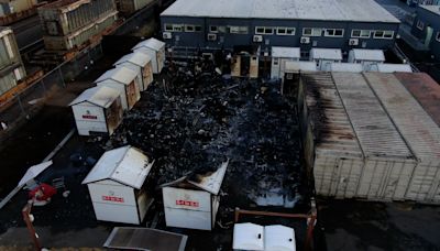 25 tiny homes at Seattle shelter damaged in fire, suspect held on $20,000 bail