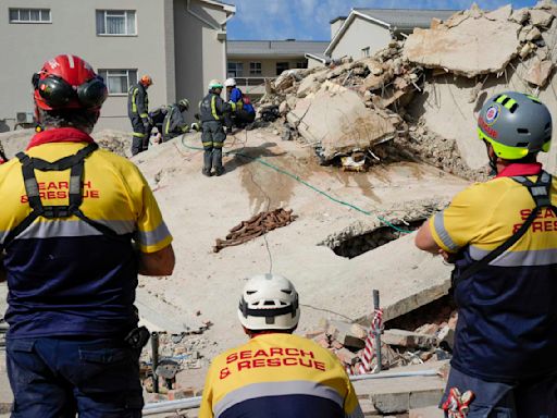 Rescue efforts for dozens missing in South Africa building collapse are boosted by 1 more survivor