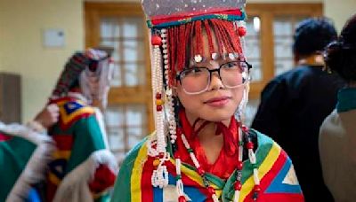 Hundreds of mostly exiled Tibetans celebrate the Dalai Lama's 89th birthday in India's Dharamshala