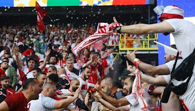 Turkey vs Georgia LIVE: Euro 2024 match marred by fan violence as heavy rain breaches stadium roof