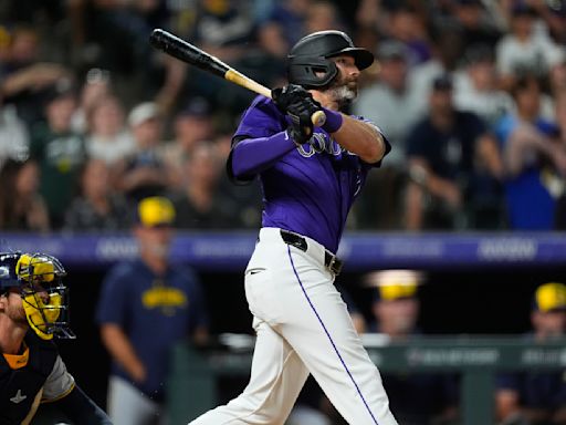 Jake Cave hits an RBI single in the 10th inning to lift the Rockies over the Brewers 8-7