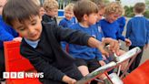 Toy bus made by Cornwall 'shedders' a hit with Looe school pupils