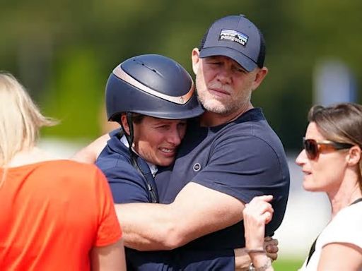 Zara Tindall puts on emotional display as she's supported by husband Mike Tindall and her father Captain Mark Phillips at day two of the Badminton Horse Trials