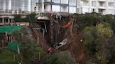 Chilean residents live in fear as homes stand precariously above sinkhole