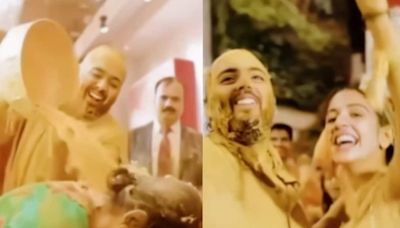 Anant Ambani Dumps A Bucket Of Haldi On Nita Ambani, Dances With Radhika Merchant In Viral Video | Watch - News18