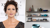 Catherine Zeta-Jones' display shelf is an example of how to decorate awkward empty spaces in a kitchen