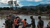 Soldiers collect life jackets from people who crossed a floating pedestrian bridge over the Forqueta River between the municipalities of Marques de Souza and Travesseiro in Rio Grande do Sul, Brazil...