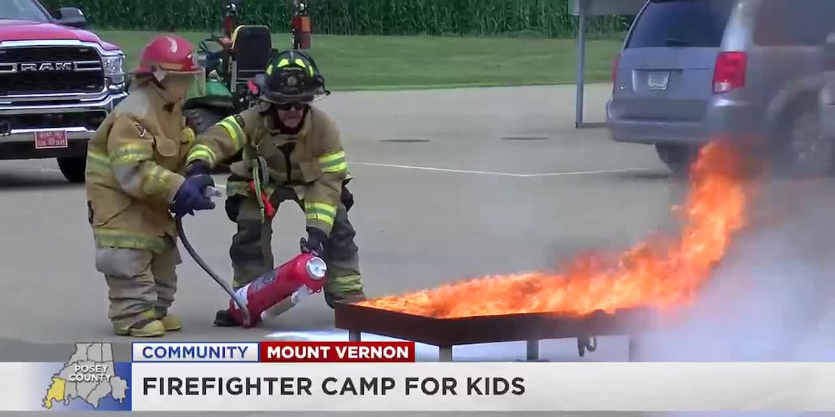 Kids learn about firefighting at summer camp