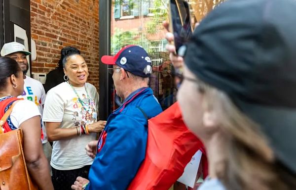 Fans lined up for hours to meet legendary basketball coach Dawn Staley at Mitchell & Ness