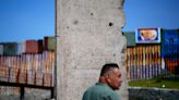 Berlin Wall relic gets ‘second life’ on U.S.-Mexico border as Biden adds barriers