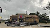 Taco Bell sign crushes Louisiana woman's car as she waits for food in drive-thru