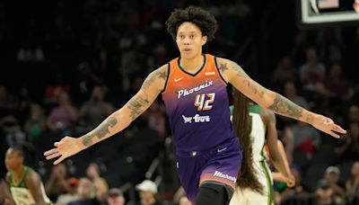 LOOK: Mercury's Brittney Griner Enjoys Cold Beer During Presser After Win over Storm