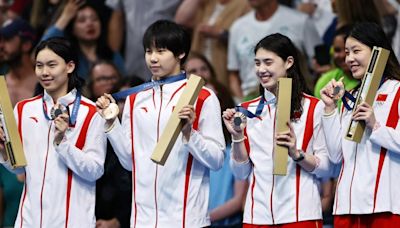 What Olympic medal winners get in the box during victory ceremony