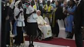 WATCH: Pope visits church in South Sudan packed with people holding up signs for peace