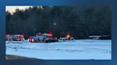 Airplane crashes into tree line near a New Hampshire airport