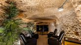 This flat with a ‘cave cinema’ is on the market for just £300,000