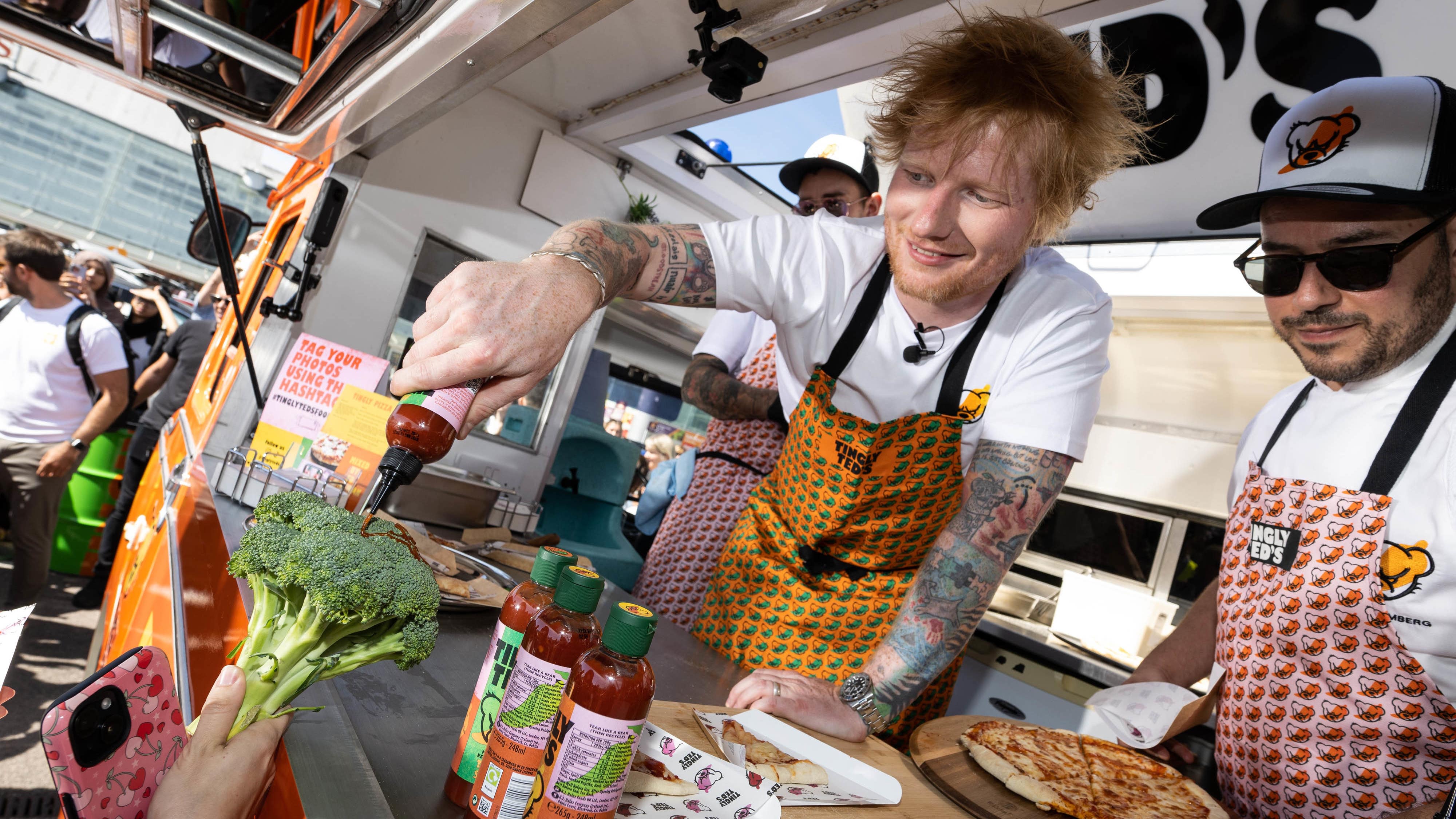 Ed Sheeran makes surprise visit to supermarket to sign autographs in hot sauce