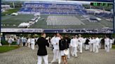 Defense secretary tells US Naval Academy graduates they will lead 'through tension and uncertainty'