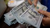 Dollar trades sideways as markets wait for central bank, economic news