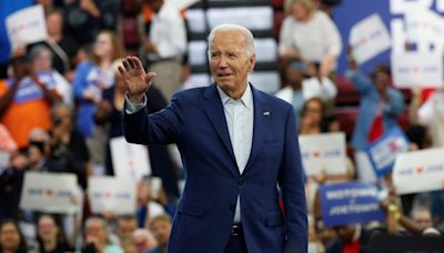 Democratic calls mount for Biden to end campaign, but he vows to fight on