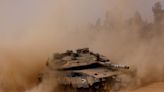 Gaza officials say Israeli tanks shell evacuation zone near Rafah, Israel denies it