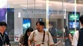 Relieved travellers land in Singapore after deadly turbulence