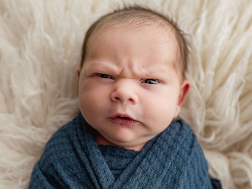 Newborn’s ‘Grumpy’ Photos Go Viral — and Leave Parents Laughing