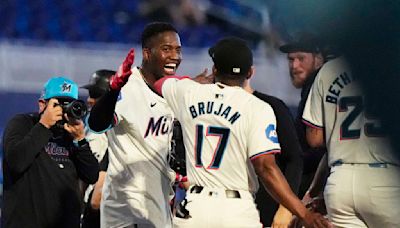 Marlins slip past Rockies 5-4 in 10 innings to cap three-game series sweep