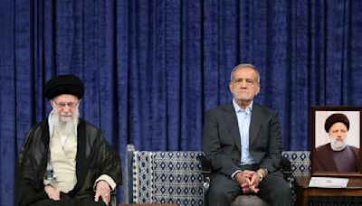 Reformist formally takes over as Iran's president after supreme leader offers endorsement