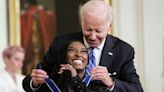 Biden awards Medal of Freedom to Biles, McCain, 15 others