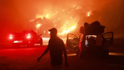 Bridge, Line, Airport and Davis fires grow in California and Nevada, displacing thousands