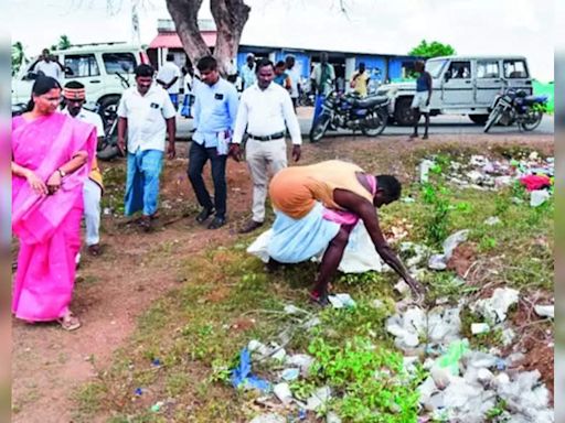 Collector directs Tasmac staff to clear plastic waste on vacant land | Trichy News - Times of India