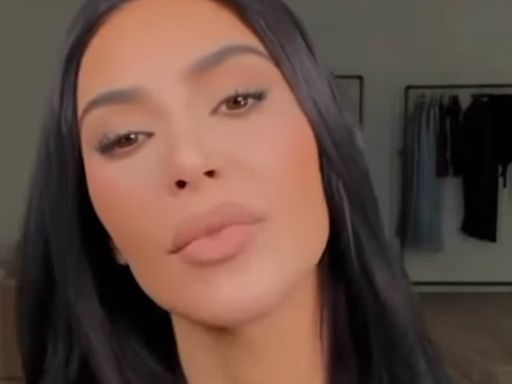 Kim Kardashian shows off her derriere during TWO hour workout