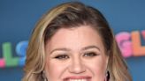 Kelly Clarkson Flaunts Her Weight Loss Transformation In A Plunging Midi Dress On ‘The Tonight Show’ As Fans Say: ‘She...