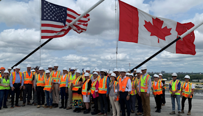 Politicians come together to celebrate Gordie Howe International Bridge deck connection