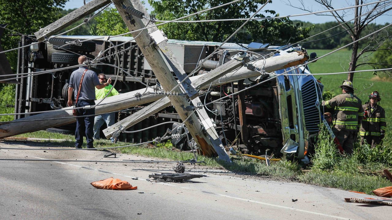 Serious crash in Chicago suburb: Box truck driver airlifted after collision with cargo van, utility pole