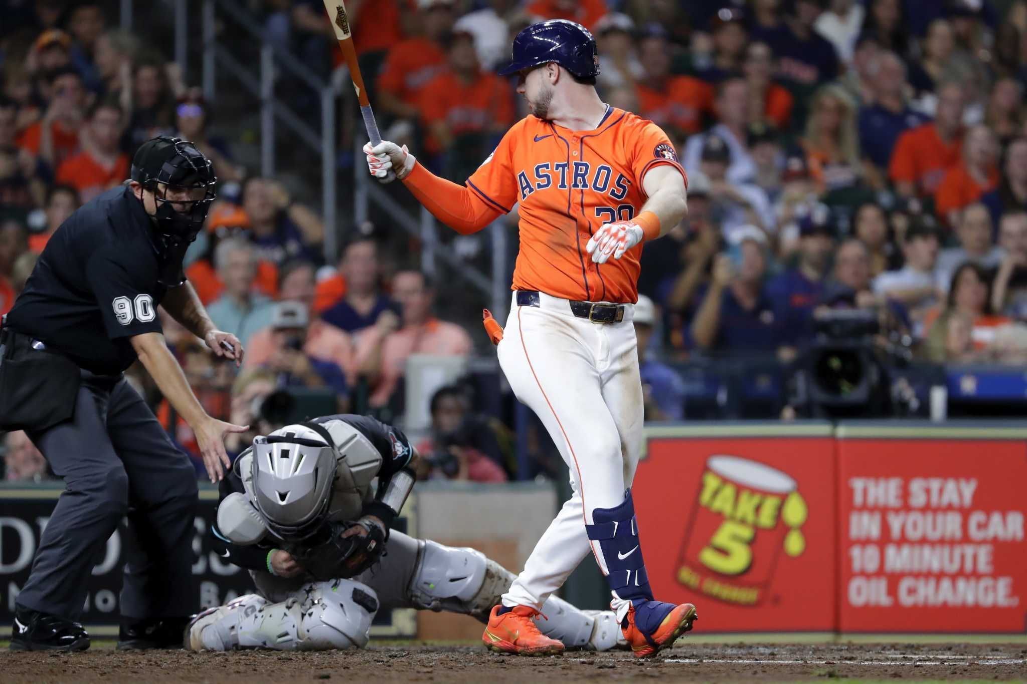 Arizona catcher Herrera leaves after being hit on top of head on follow-through