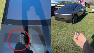Tesla Fan Climbs on Cybertruck to Show How Tough It Is, Accidentally Cracks Windshield