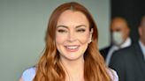 Lindsay Lohan Shows Off Growing Baby Bump in Black Swimsuit