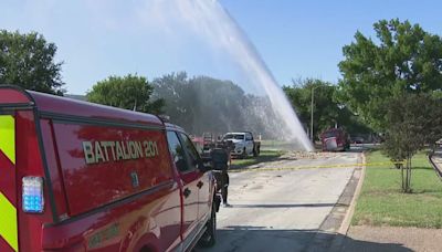 Water line busts after big rig gets caught in sinkhole north of Austin