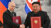 Putin and Kim Jong-un sign mutual defence pact in case of attack on Russia or North Korea