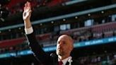 Erik ten Hag holds the FA Cup after Manchester United won the final 2-1 against Manchester City on May 25